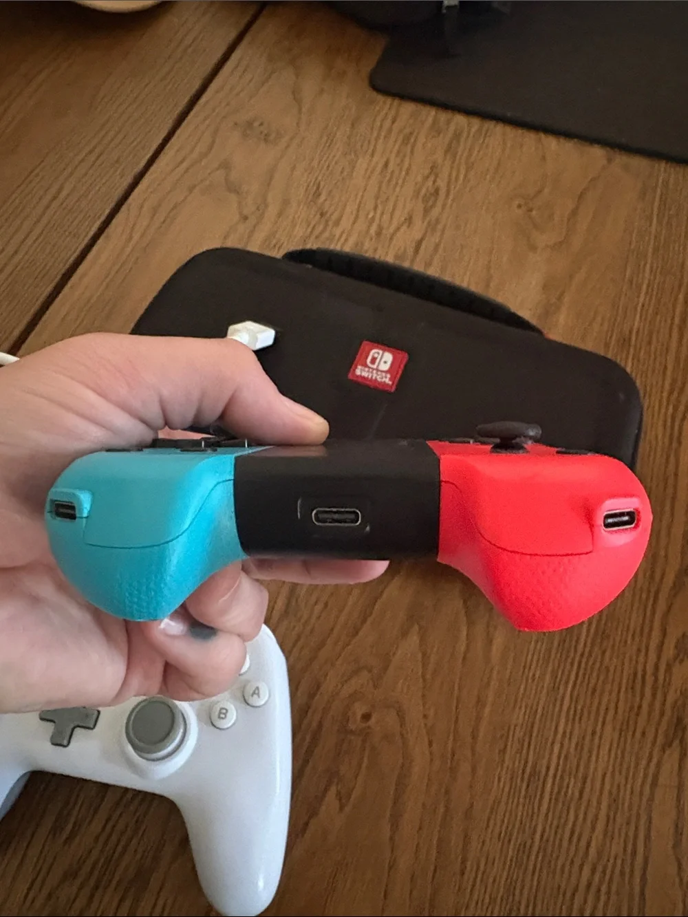 Nintendo Neon Blue & Neon Red Joy-Con Pair with White Wired Pro Controller